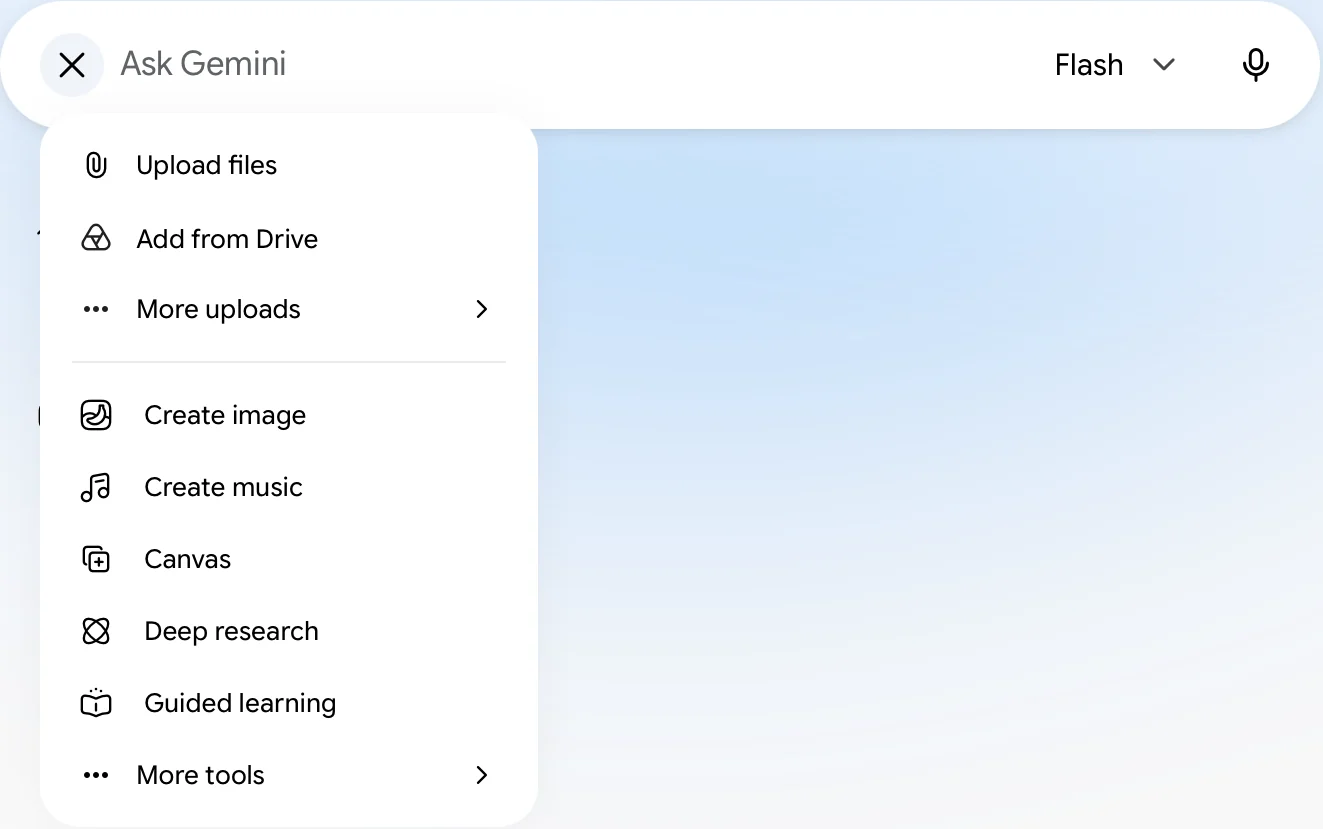 The plus menu under Gemini's chat box: Upload files, Add from Drive, More uploads, then Create image, Create music, Canvas, Deep research, Guided learning and More tools.