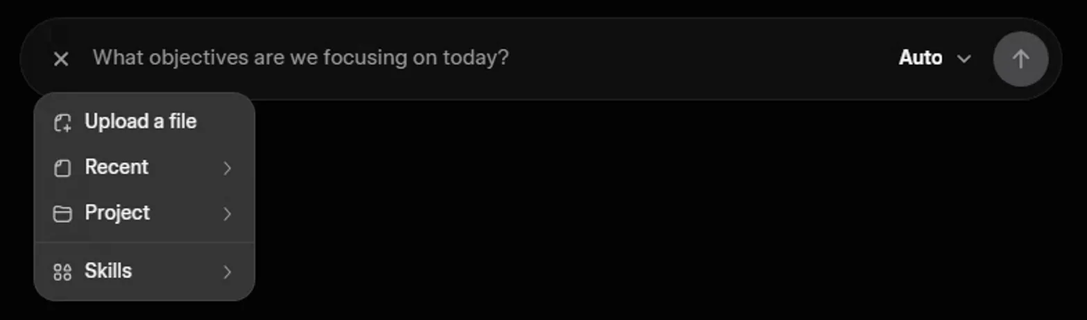The plus menu under the Grok chat box: Upload a file, Recent, Project and Skills.