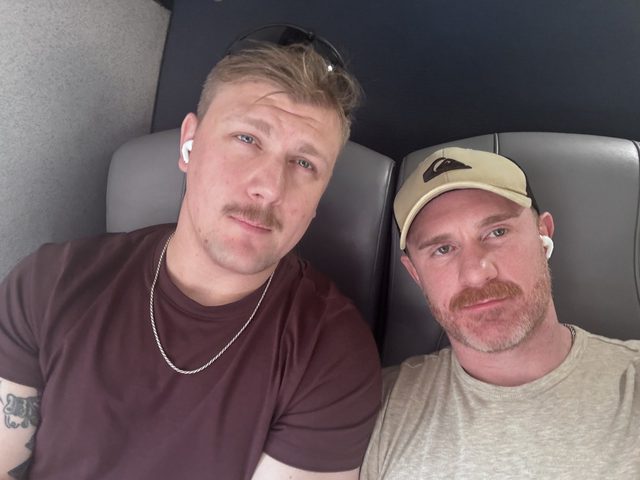 Derek and Sean on a plane