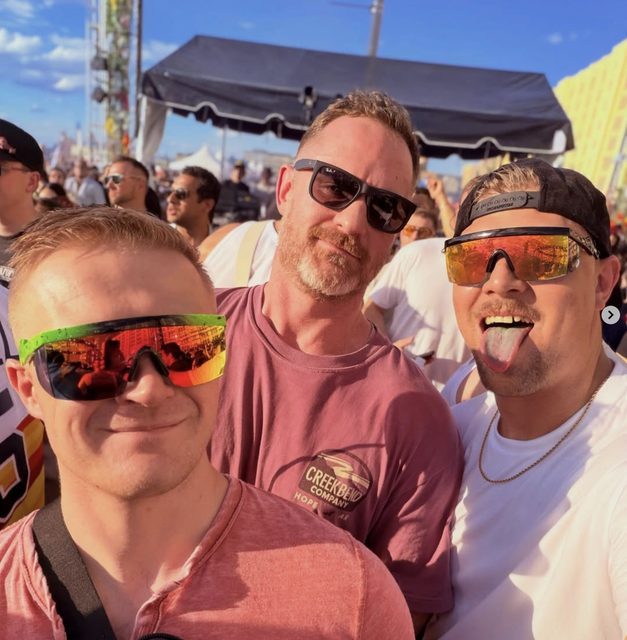 Taylor, Sean, and Derek in sunglasses at a festival